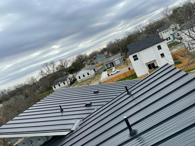 Standing seam metal roof panels with vents for Skylight Repair in Lake St. Louis